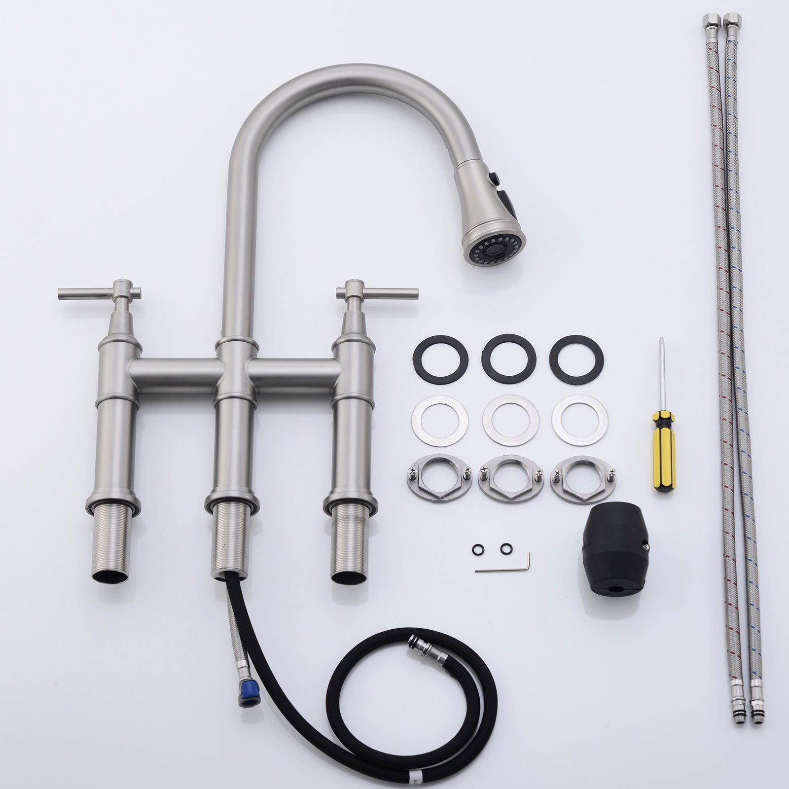 A clean kitchen sink area representing common questions about three-hole kitchen faucets.