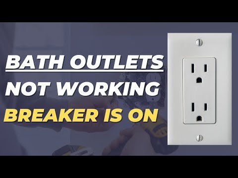 A GFCI outlet in a garage that may control bathroom electrical circuits.