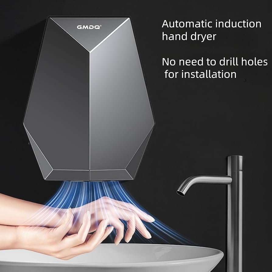 A person cleaning the air intake vent of a residential hand dryer unit.