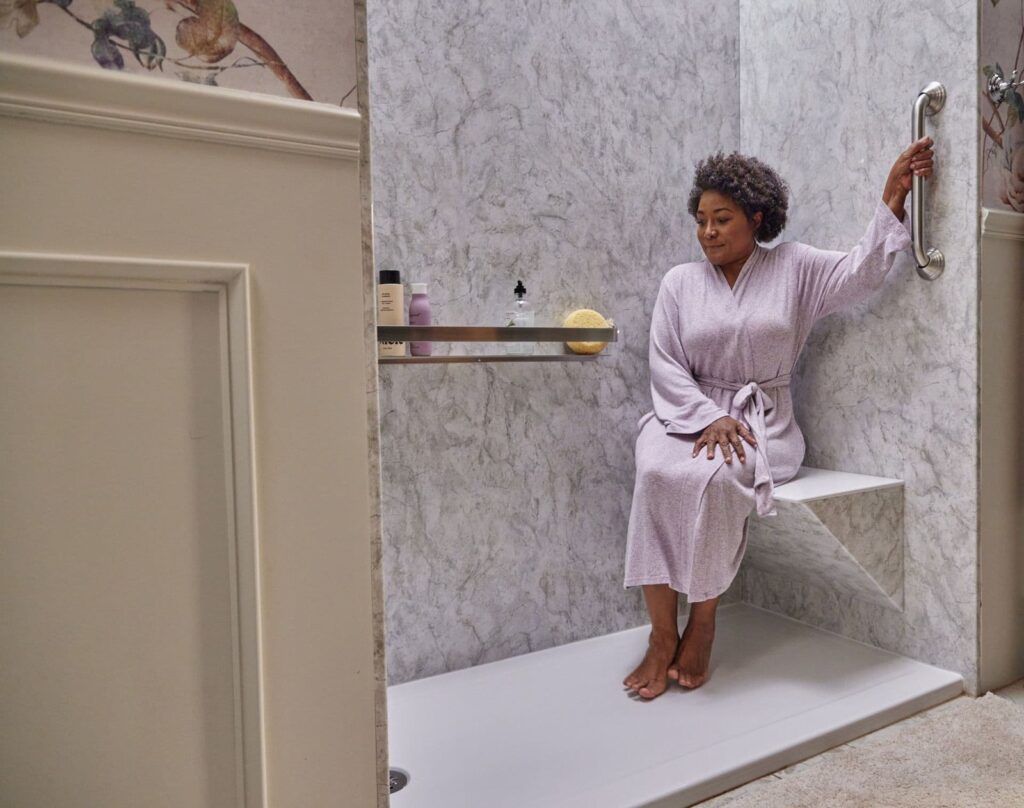 A luxurious modern bathroom remodel with high-end fixtures and natural light.