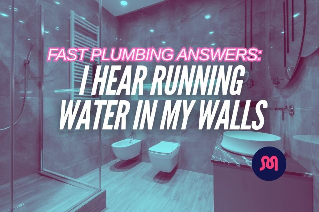 A modern bathroom wall showing subtle signs of potential hidden water pipe issues.