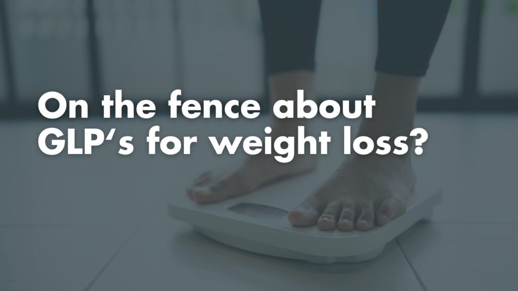 A person stands on a digital bathroom scale to monitor their weight loss progress.