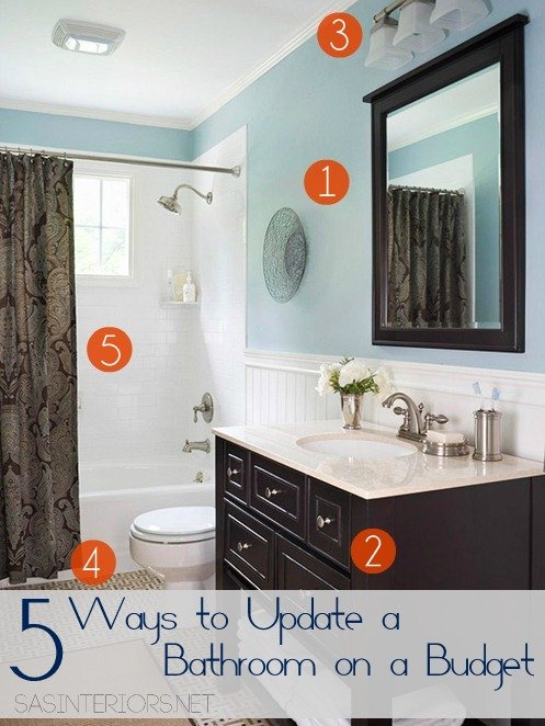 A smooth, professional paint finish on a bathroom vanity cabinet door corner.