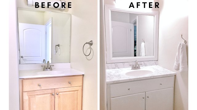 A modern, updated bathroom vanity with fresh paint and new hardware in a bright room.