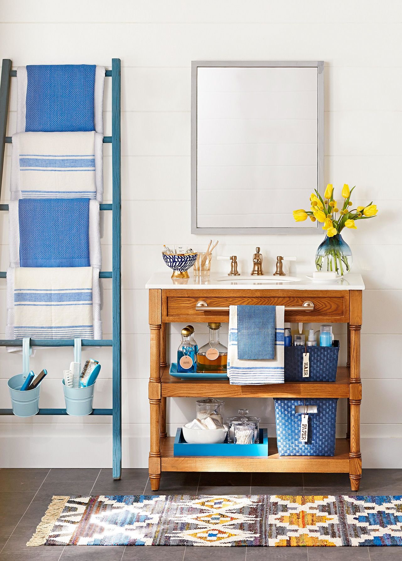 A stylish, space-saving towel rack installed in a small modern bathroom corner.