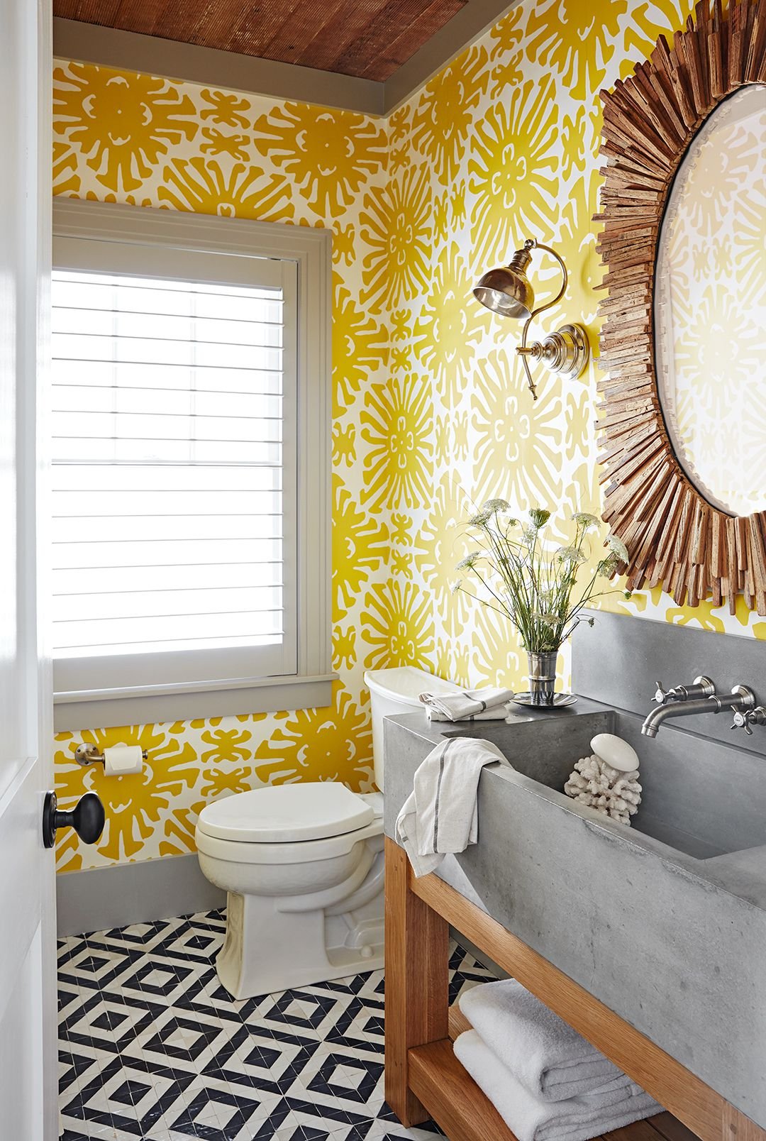 A clean and modern bathroom vanity arrangement featuring a small mirror for frequently asked questions.
