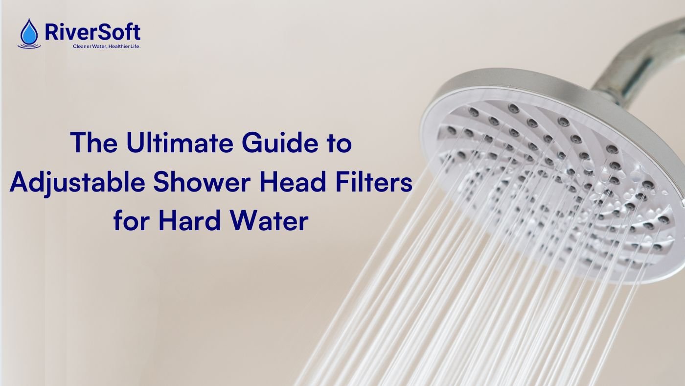 Hand pressing the toggle switch on a handheld shower head to control water.