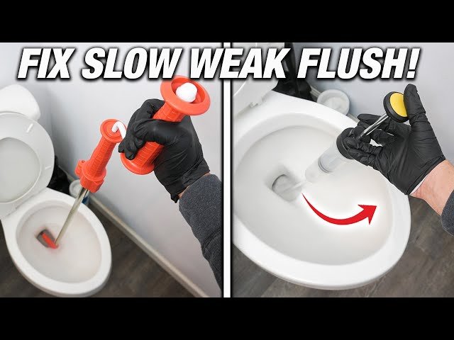 A clean white toilet in a bright modern bathroom representing slow flushing toilet repair.
