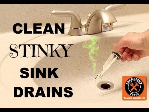 A bright and clean bathroom sink area representing effective bathroom sink odor removal.
