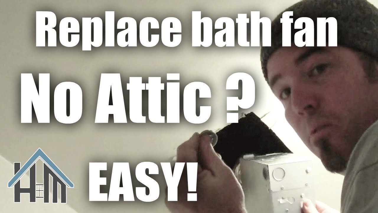 Tools and instructions on a vanity for a bathroom exhaust fan project.