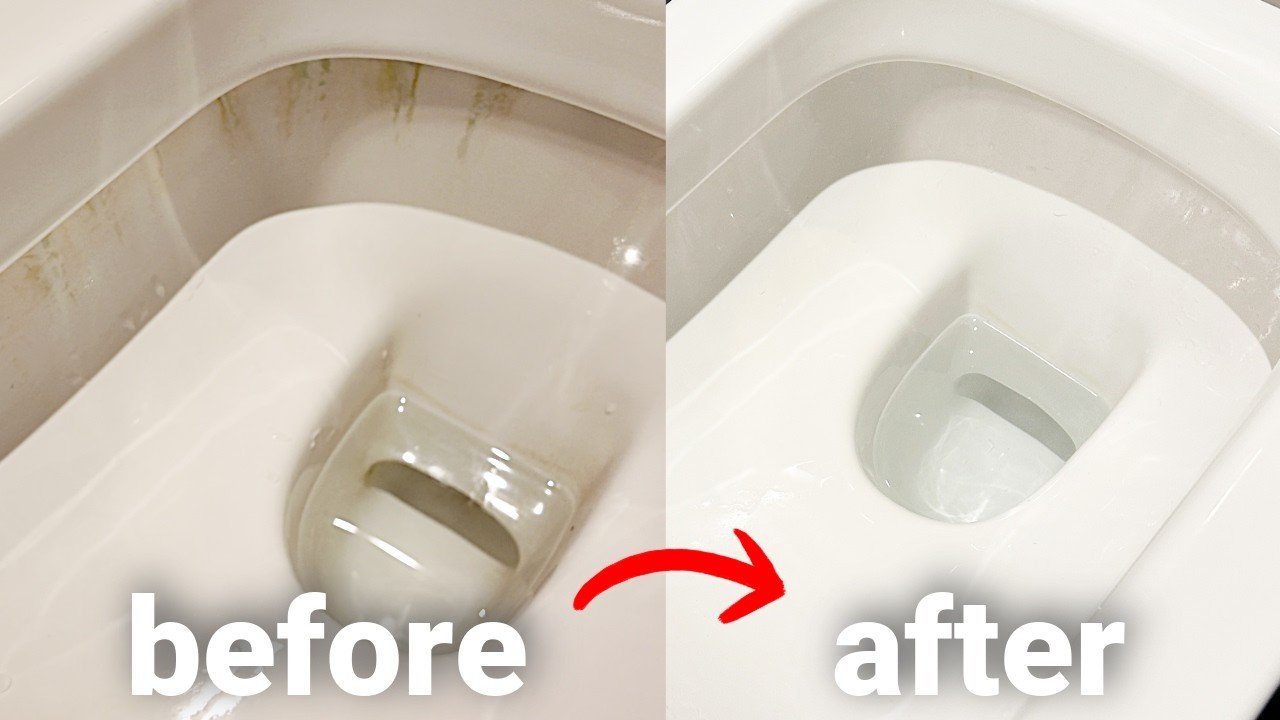 A clean toilet rim being inspected with a flashlight to verify stain removal.