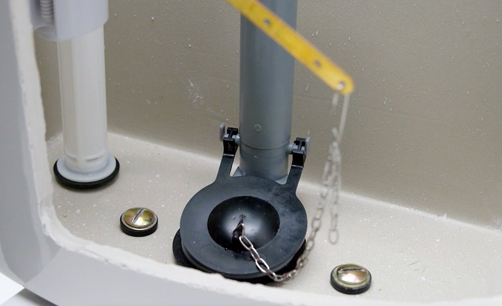 A properly installed and level toilet tank showing no signs of wobbling or leaks.