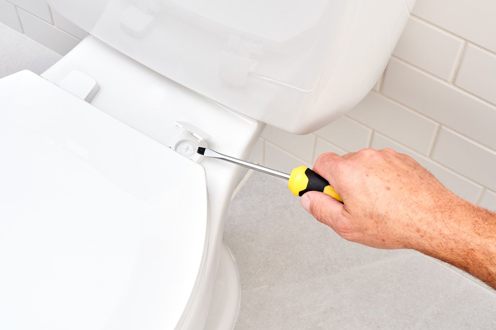 A modern, clean bathroom interior provides a calm backdrop for frequently asked questions.