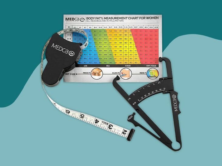 A modern smart scale sits on a bathroom floor to measure body fat accurately.
