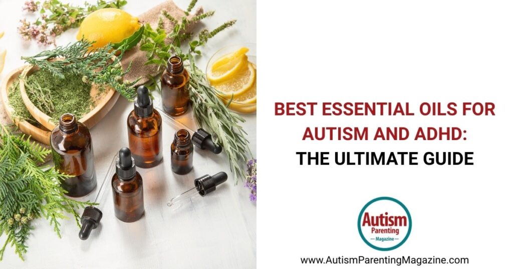 A collection of essential oils and fresh botanicals arranged on a wooden table.