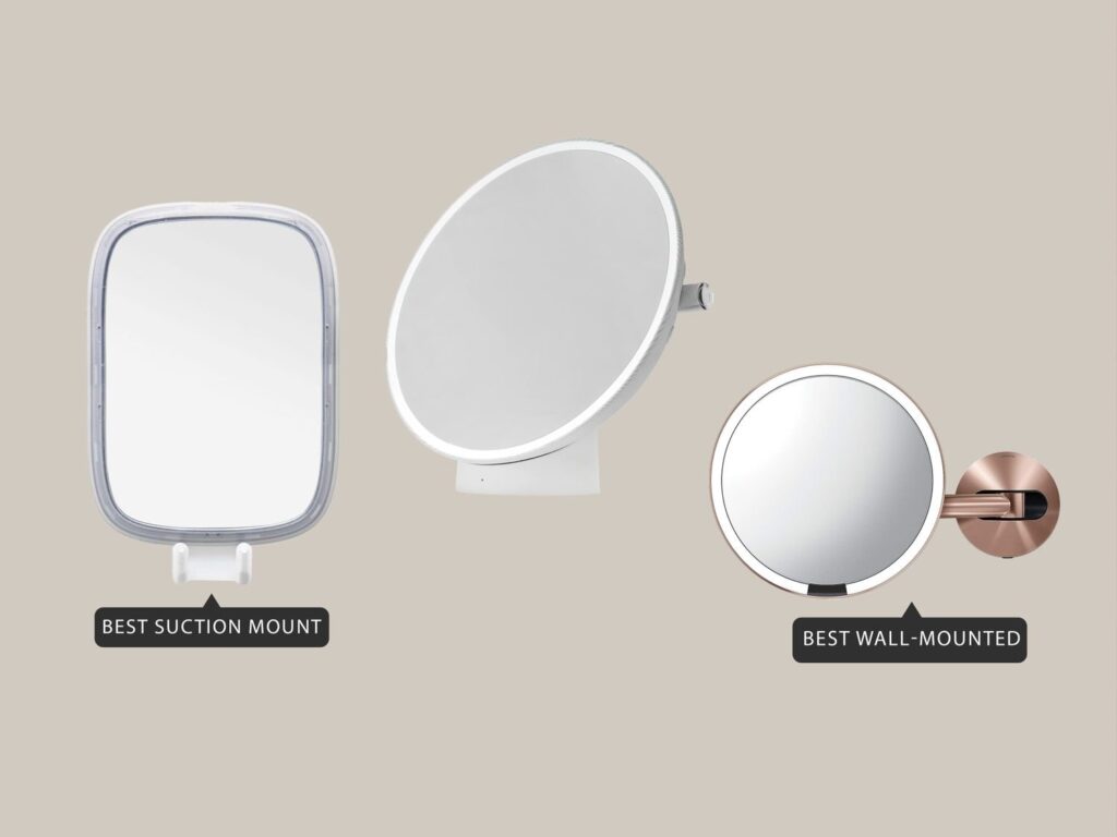 Three different makeup mirror types displayed on a marble vanity for clear reflection.