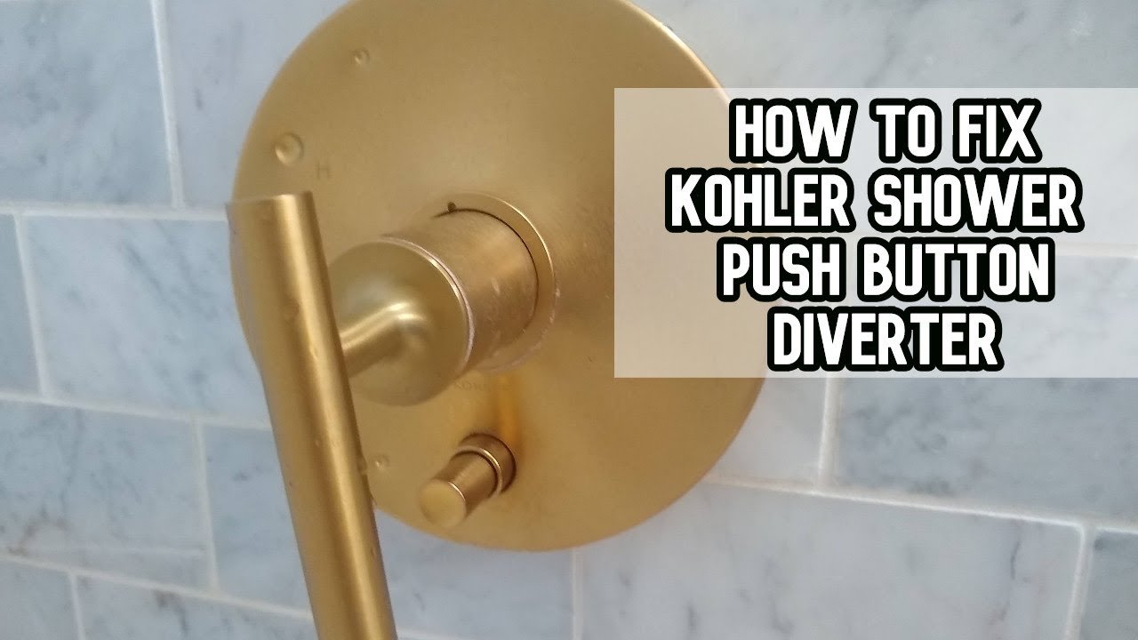 Mineral scale buildup on a chrome shower diverter button causing mechanical failure.