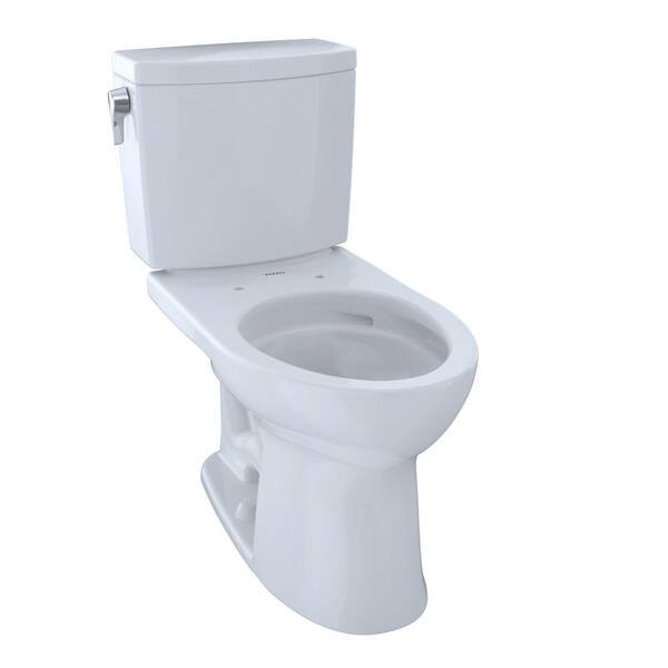 Side profile of a Toto Drake II toilet in a well-lit bathroom.