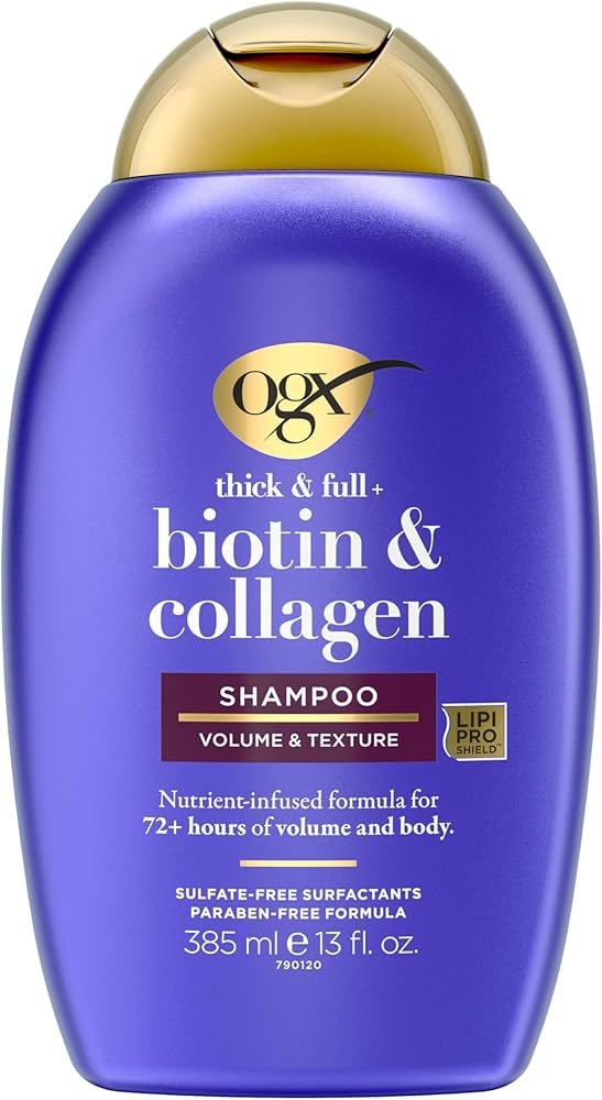 Biotin and collagen shampoo bottle next to a wide-tooth comb and towel.