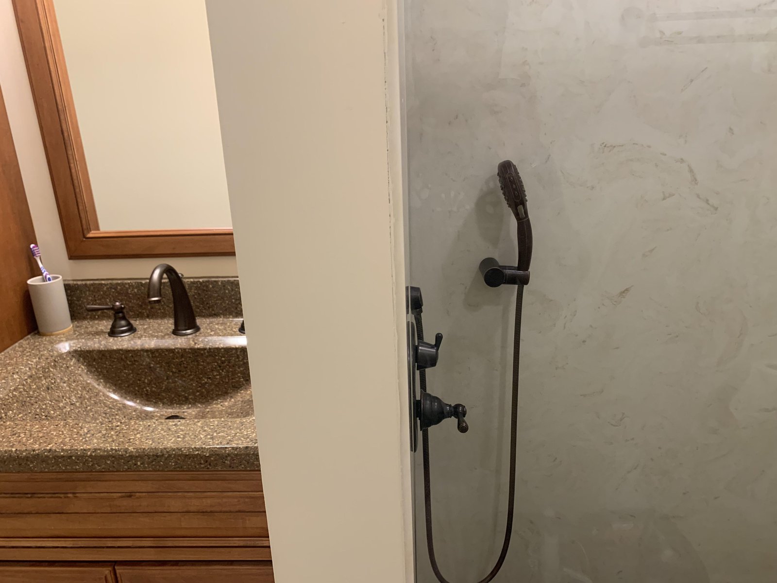 A faulty shower diverter valve causing water to flow only from the tub spout.