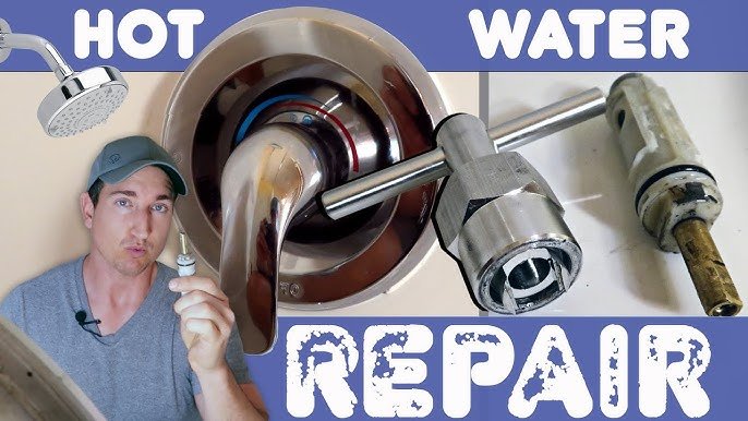 A disassembled shower mixing cartridge resting on a towel next to plumbing tools.