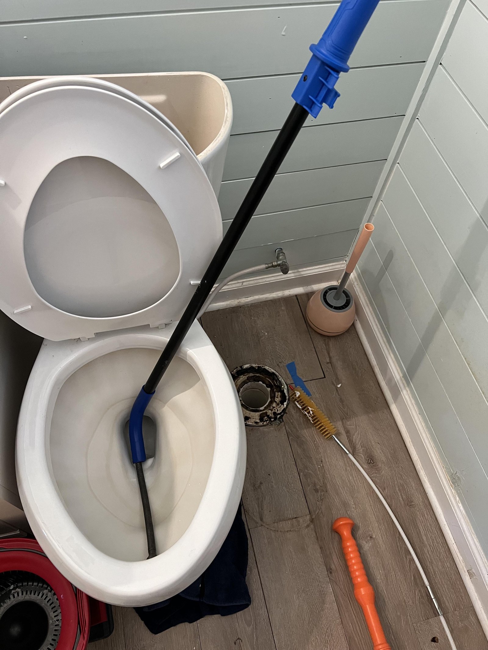 A clean and organized bathroom space for helpful maintenance information.