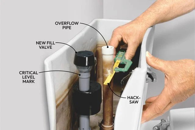 A new toilet tank fill valve kit ready for installation in a bathroom.