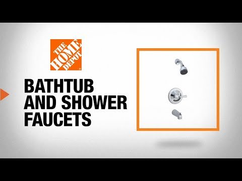 Close up of tools used to repair a leaking tub and shower faucet combo.