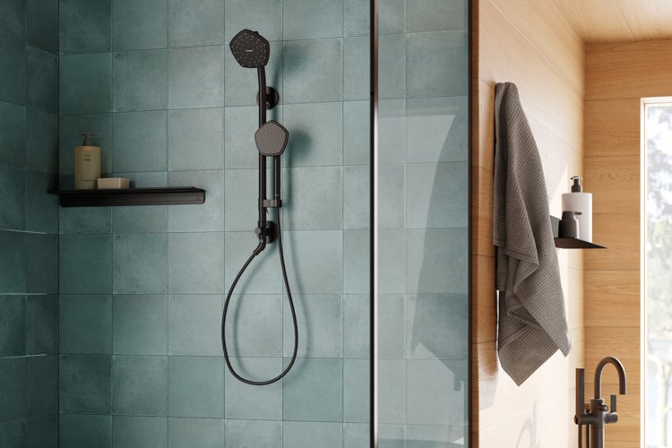 A modern tub and shower faucet combo installed in a bright luxury bathroom.