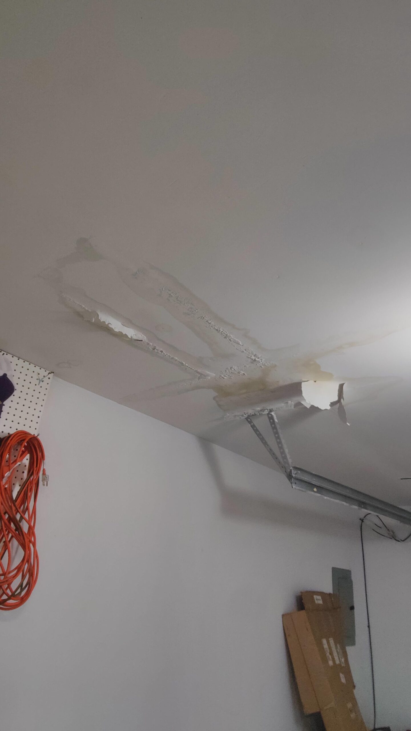 Maintenance tools used for diagnosing and fixing a home water leak.