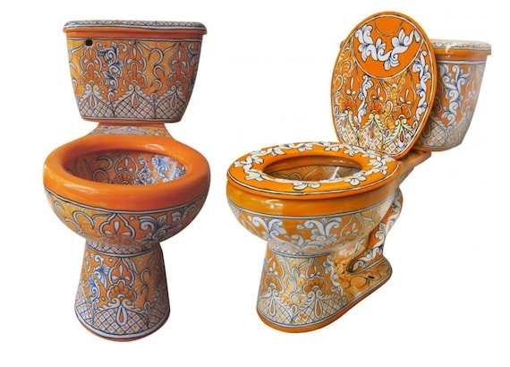 A clean, modern Western Pottery toilet installed in a bright and minimalist bathroom space.