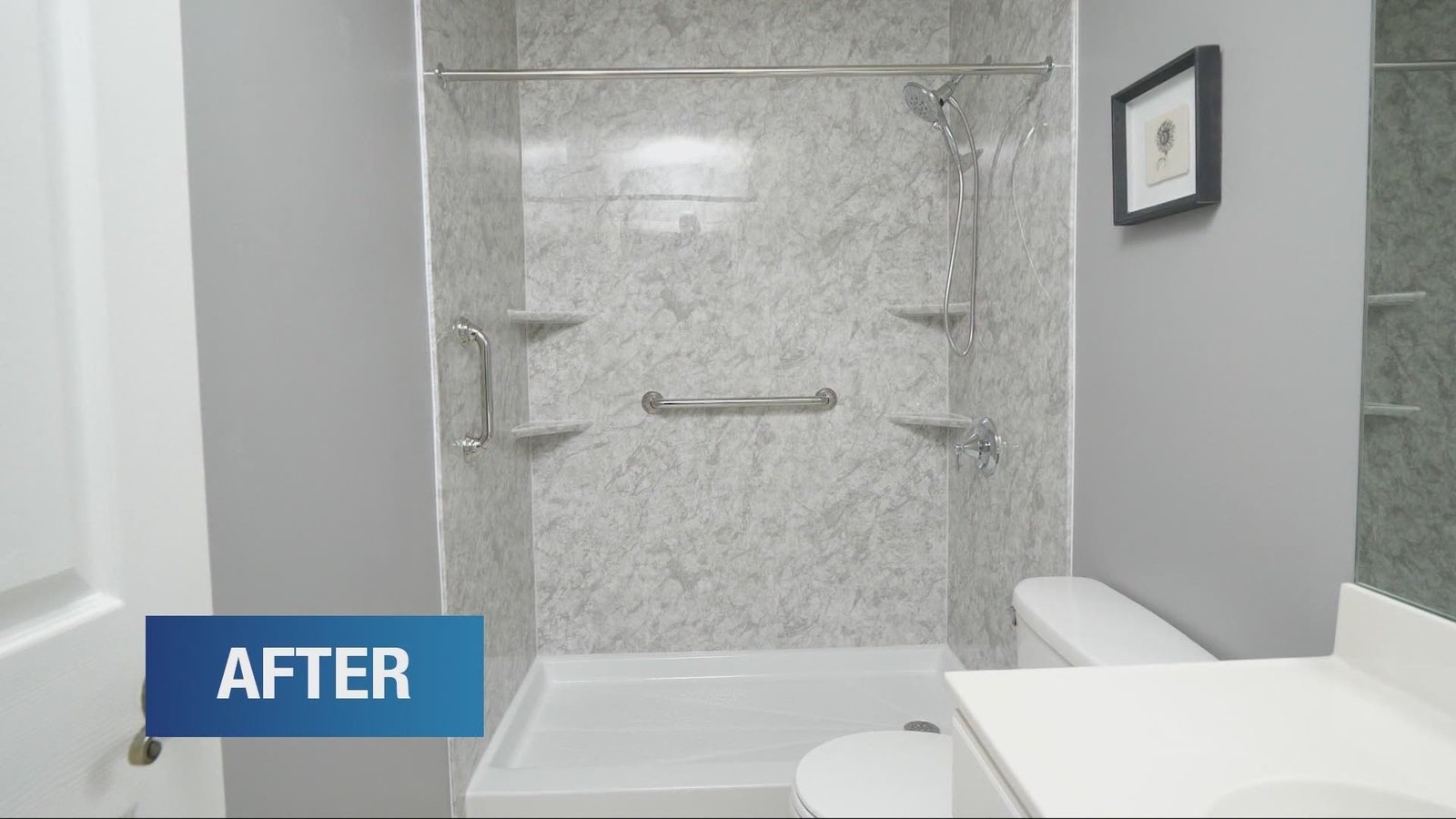 A close-up of a damaged bathroom shower base next to new installation materials.