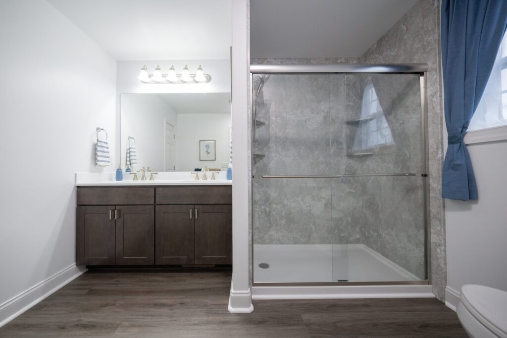 A modern bathroom remodel showcasing high-end fixtures and clean, bright design elements.