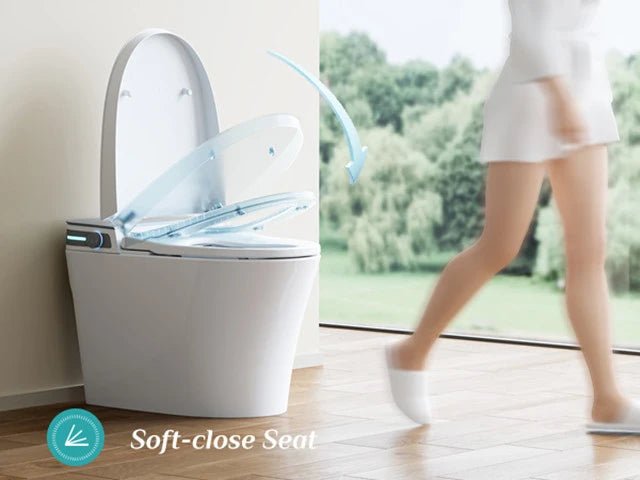 A properly installed elongated toilet with clear floor space in a modern bathroom.