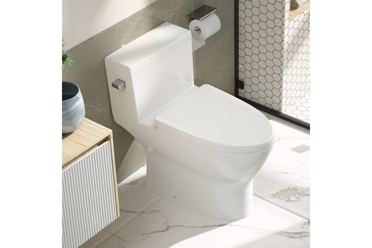 A clean modern elongated toilet sits in a bright, minimalist contemporary bathroom interior.