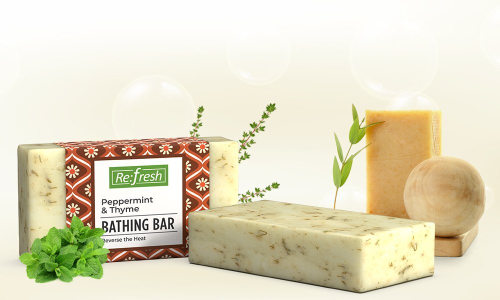 A person inspecting the ingredient label on the back of a soap package.