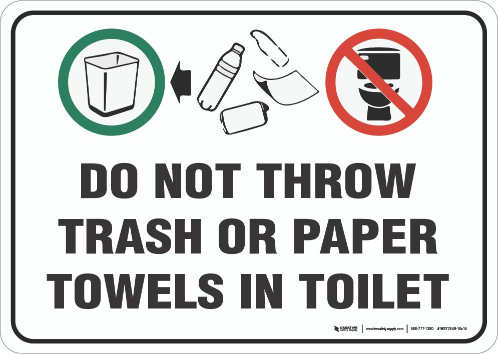 A clean folded towel next to a small bin for proper waste disposal.