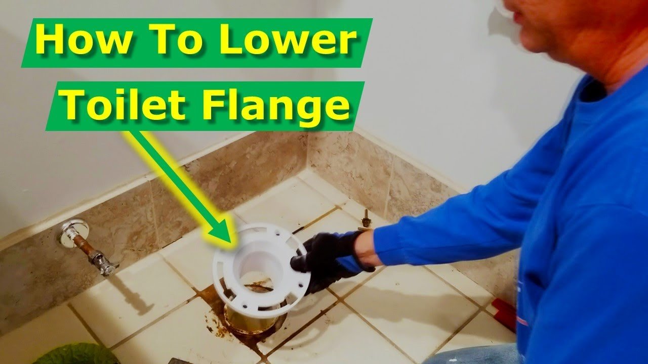 Essential plumbing tools for resolving toilet flange height issues are neatly arranged.